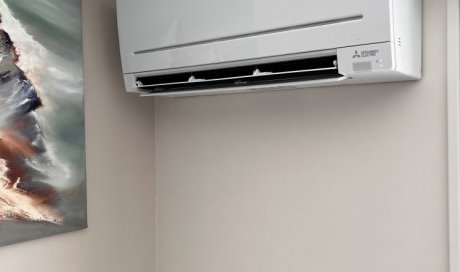 Installation d'une climatisation Mitsubishi dans un appartement à La Buisse